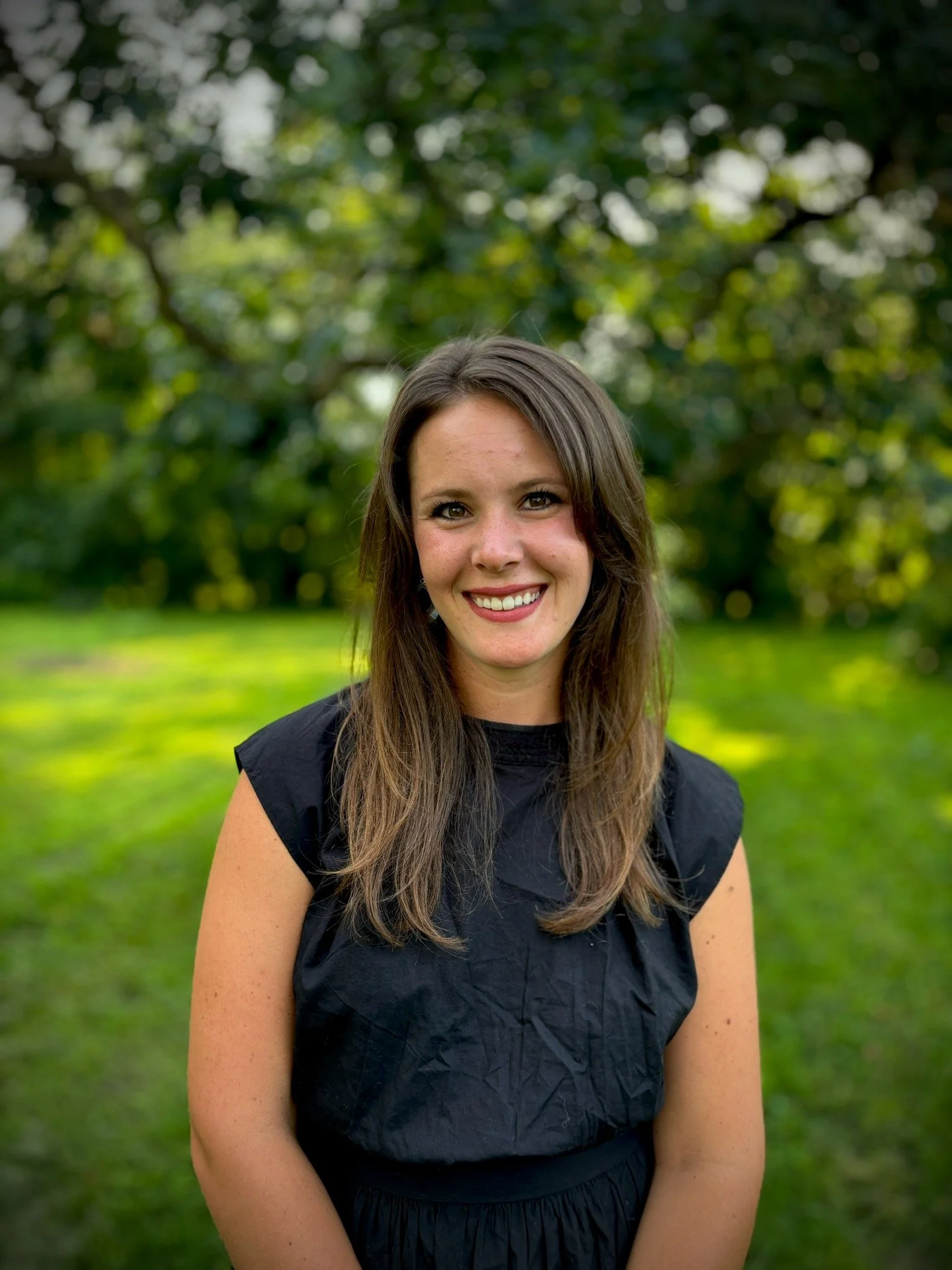 Betsy with student materials